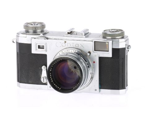 A Zeiss Ikon Contax IIa 35mm Rangefinder Camera chrome, serial no. P 97605, early model with PC flash socket, with a Zeiss-Op