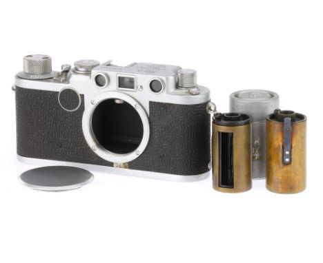 A Leica IIf Rangefinder Body, chrome, serial no. 808553, 1956, body G, shutter working, RF patch dim but visible, some damage
