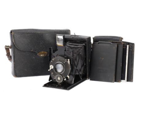 An Adams Vesta Folding Film Plate Camera Cased Outfit, black, serial number 157, bellows extends but not light checked, shutt