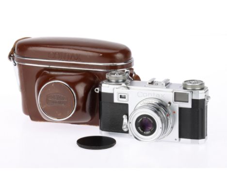 A Zeiss Ikon Contax IIa 35mm Rangefinder Camera chrome, 1950-54, serial no.S 26027, with a Carl Zeiss Tessar f/3.5 50mm lens,
