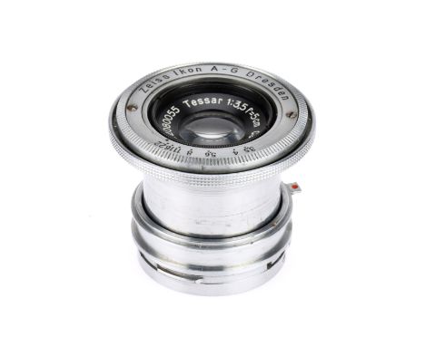A Carl Zeiss Jena Tessar f/3.5 5cm Camera Lens silver, serial 2080055, barrel G, optics F with haze.