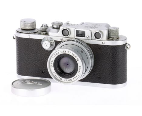 A Leica IIIb Rangefinder Camera, chrome, serial no. 283868, body, G, shutter working, small mark to bottom plate, with Leitz 