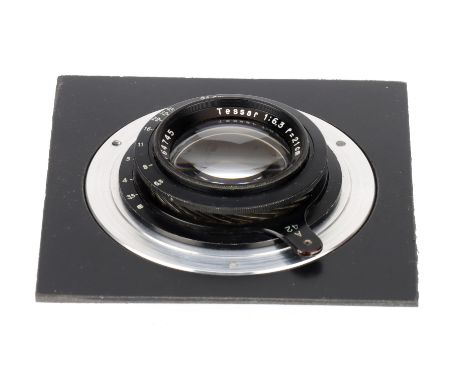 A Carl Zeiss Tessar f/6.3 21cm Large Format Lens black, serial number 2764745, barrel G, optics G with ivery light haze, in a