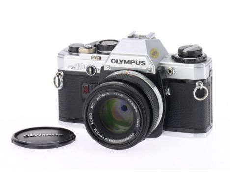 An Olympus OM-10 35mm SLR Camera, silver, body G, minor dings to bottom plate, shutter works, with Zuiko f/1.8 50mm lens, bar