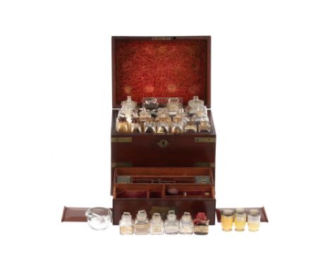 A 19th Century Domestic Medicine Chest, English, mahogany trunk-type chest with brass fittings, velvet lining to the interior