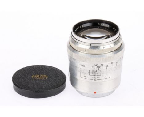 A Zeiss-Opton Sonnar T f/2 85mm Camera Lens chrome, serial 839452, barrel F with usage marks, optics G with light dust, with 