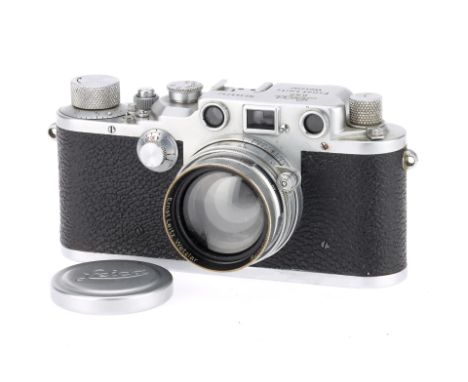 A Leica IIIc 35mm Rangefinder Camera, silver, serial number 369792, body G, light usage marks to bottom plate, shutter works,