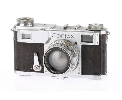 A Contax II Rangefinder Camera, silver, serial number K60612, body F, shutter works but curtains are slow, with a Carl Zeiss 