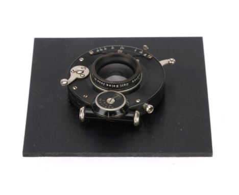 A Carl Zeiss Jena Doppel Anastigmat f/6.8 15cm Lens black, serial number 124759, barrel G, optics F-G with light haze, in a F