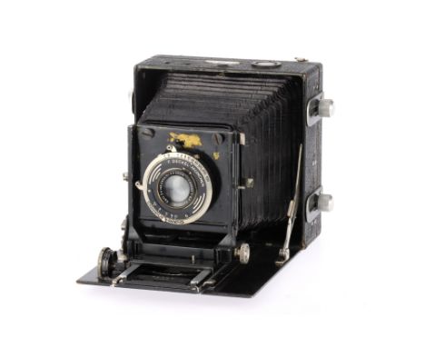 A Perka Trio Plate Film Camera black, body F-G, bellows appear good, not light tested, with a Carl Zeiss Jena f/6.3 13.5cm le