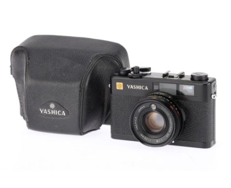 A Yashica Electro 35 CC 35mm Rangefinder Camera body VG, optics VG, meter appears to work, f/1.8 35mm lens, rangefinder patch