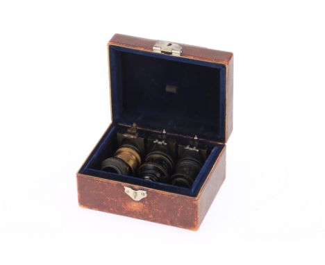 Cased Set of Carl Zeiss Microscope Microphotography Lenses, leather covered case stamped to the top in gilt lettering 'SCHLIT