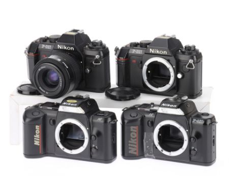 A Selection of Nikon F-series 35mm SLR Camera Bodies to include an F301 with Nikkor 35-70 kit lens, body G, shutter works, in