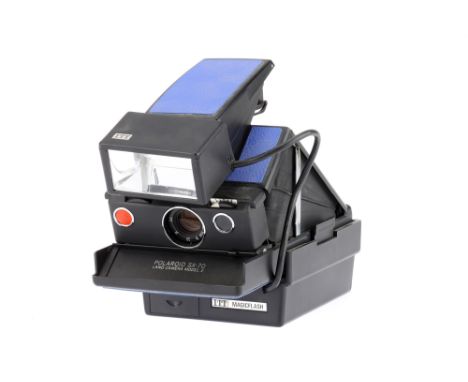 A Polaroid SX-70 Model 2 Land Camera blue, body G, untested with film, viewfinder optics G, focus works, taking optics untest