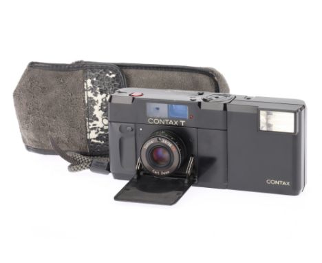 A Contax T 35mm Compact Rangefinder Camera works when batteries inserted, with Sonnar f/2.8 38mm lens, rangefinder patch is c