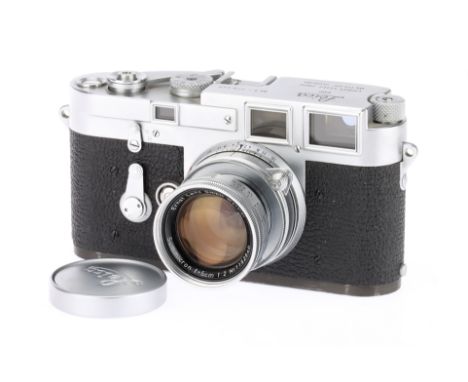 A Leitz Wetzlar Leica M3 Delay DS Rangefinder Camera chrome, 1955, serial no.778448, with a Leitz Wetzlar Summicron f/2 5cm (