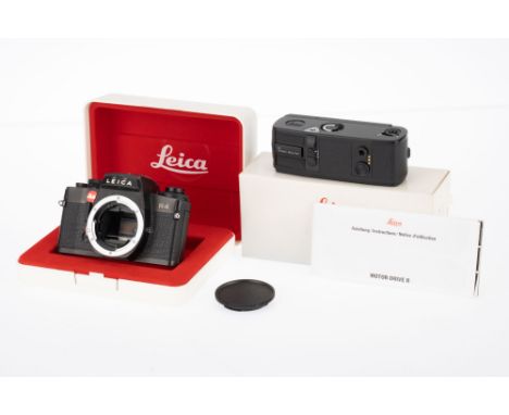 A Leica R4 35mm SLR Camera Body, and Motor Drive, black, serial number 1609708, body VG, shutter works in manual mode when ba