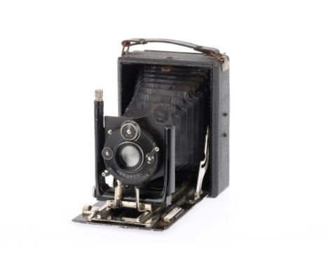 A Contessa Nettel Folding Plate Camera, black, body F-G, some paint wear, bellows extends but not light tested, shutter works
