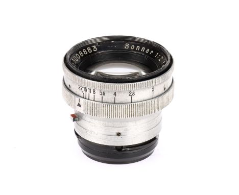 A Carl Zeiss Jena Sonnar f/2 5cm Camera Lens silver, serial 3008883, barrel F some paint loss and damage to filter ring, opti