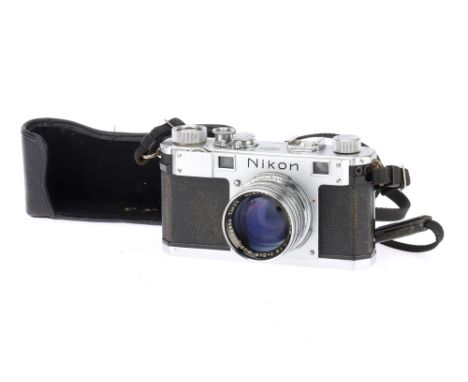 A Nikon S 35mm Rangefinder Camera, silver, serial number 6105611, body G, light wear to leatherette and usage marks to bottom