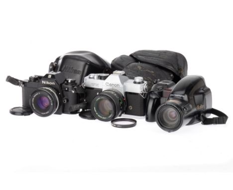 A Selection of 35mm SLR Film Cameras, comprising a Nikon EM, body G, shutter works, metering responds to light, with f/1.8 50