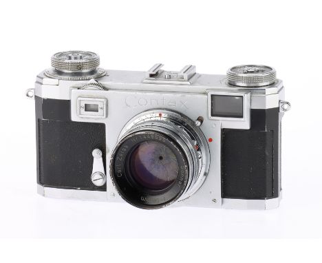 A Contax II 35mm Rangefinder Camera silver, body F-G, shutter is sticky at slow speeds, serial L85798, rangefinder patch clea