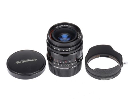 A Voigtlander Ultron Aspherical f/1.9 28mm Lens black, made in Japan, serial no.9120001(possible first in production run), Le