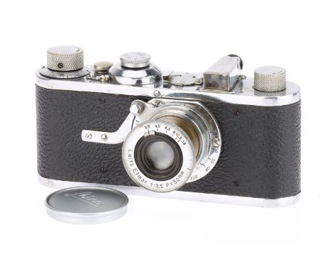 A Leica I Model A 35mm Camera circa 1930, with a Leitz Elmar f/3.5 50mm collapsible lens, shutter working, body F-G, top and 
