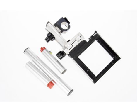 A Front Standard from a Sinar Large Format Camera, silver, opening is approximately 13cm square, possibly for Model F, with s