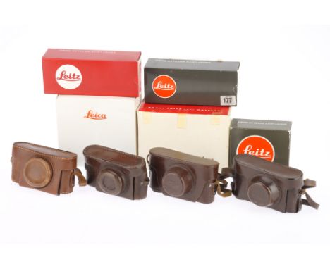 A Collection of Leica Boxes and Camera Cases comprising the boxes for a Leicaflex SL or SL2 leather case (14504), Leica R7 le