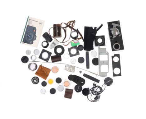A Mixed Collection of Leica and Other Accessories including a Leitz General Catalogue of July 1977, a Focoslide focusing stag