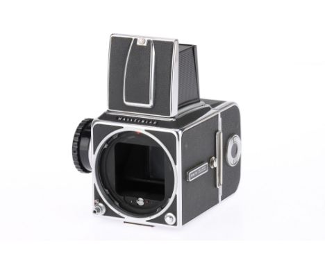 A Hasselblad 500C/M Medium Format SLR Camera Body dark grey/chrome, 1982, serial no.RH 1272505, protective shutter and mirror