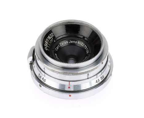 A Carl Zeiss Jena Orthometar f/4.5 3.5cm Camera Lens silver, serial 2235109, barrel G, optics F with haze,