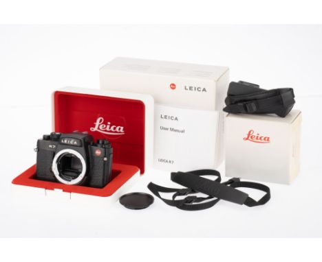 A Leica R7 35mm SLR Camera Body, black, serial number 2173992, body VG, shutter works in manual mode when batteries inserted,