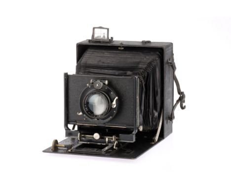 A Linhof Präzisionskamera 13x18cm Large Format Folding Camera blaxk, 1910-1935, with an E.Krauss Paris Tessar Zeiss f/4.5 len