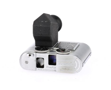 A Tessina Model L Sub-Miniature Film Camera silver, serial 767648, shutter working but speeds inconsistent, with eye-level vi