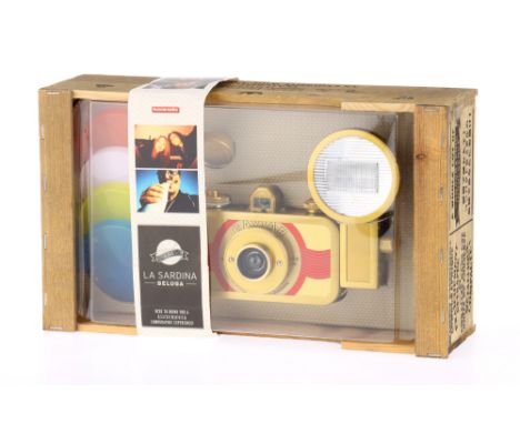 A Lomography "La Sardina" Camera Outfit, 35mm camera, flash and gels, untested to preserve the packaging, as new in maker's p