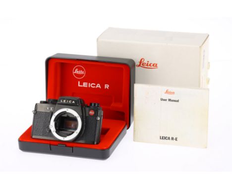A Leica R-E 35mm SLR Camera Body black, body G, light marks to lens mount, shutter lag of a fraction of a second, with batter