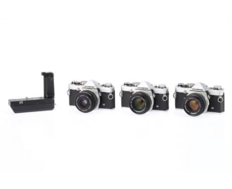 A Group of Olympus OM-1 35mm SLR Cameras, comprising body serial number 1377317, shutter works, body G, tripod marks to botto