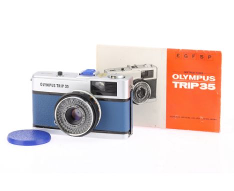 An Olympus Trip 35 Viewfinder Camera blue/silver, body G, apertures work on manual, shutter fires on manual and automatic, me
