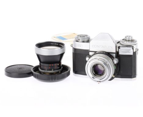 A Zeiss Ikon Contaflex IV 35mm SLR Camera and additional lens silver, body G shutter works, selenium meter responds to light,