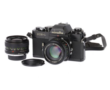 A Minolta XE-1 345mm SLR Camera, black, shutter working, with an MC Rokkor-PF f/1.7 50mm, optics VG, also with a MC.Rokkor f/