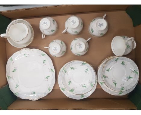 Salisbury fine bone china tea set consisting of 6 cups, 6 saucers, 8 side plates, cake plate, milk and sugar ( 1 tray) 