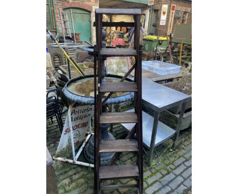 Vintage set of wooden lattice step ladders. 