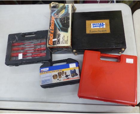 A collection of tools to include cased screwdriver set, black and decker plainer and driller, etc 