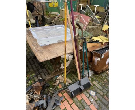 A quantity of mostly wooden handled vintage garden tools and impliments, spades, shoves, forks, hoes, axe etc. 