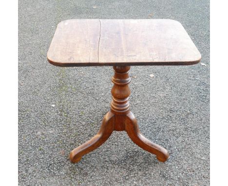 Victorian oak tip top table on tripod supports, split top. 