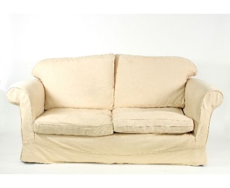 An upholstered sofa fitted loose seat and back cushions, upholstered in cream damask, 196cm wide