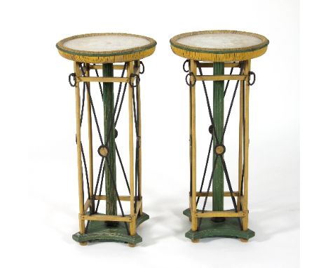 Maison Carlhian (1867-1975): A pair of French painted gueridons, each with a circular top with caned surround above an openwo