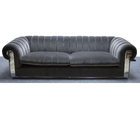 A large brown Fendi sofa, with chrome trim marked Fendi, 270cm long x 115cm deep Condition Report: Overall in good condition 